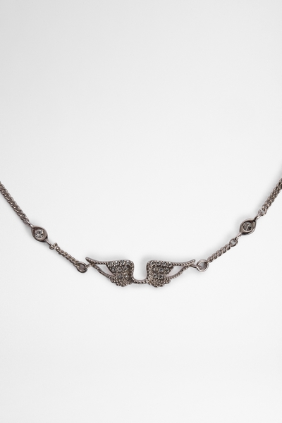 This chain necklace is adorned with sparkling crystals and