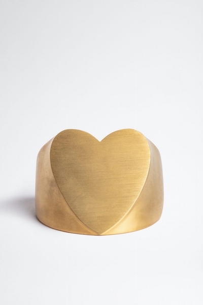 This rigid cuff bracelet has a heart. Zadig&Voltaire women's