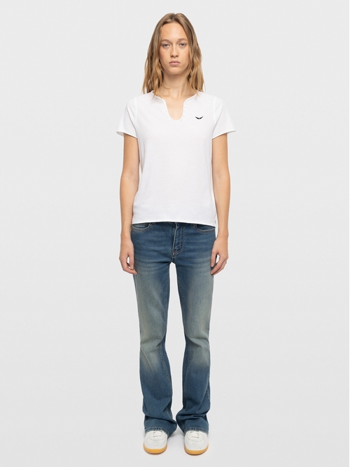 Short-sleeved henley t-shirt with snake prints on the back.