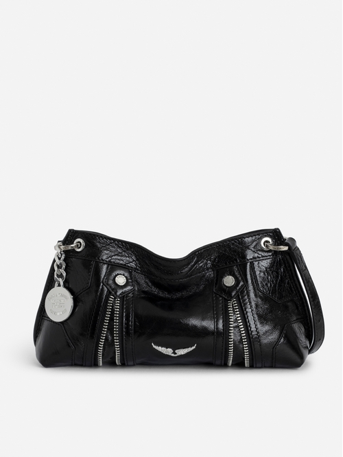 Black vintage-effect patent leather bag with medallion charm