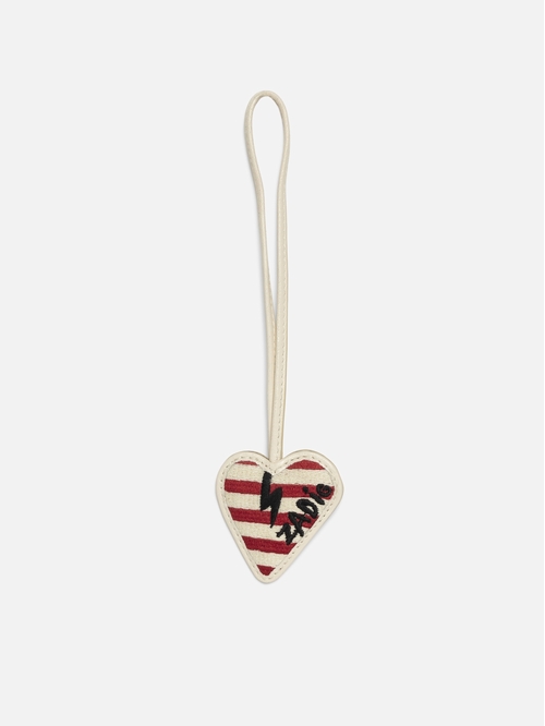 Lucky charm in heart-shaped patent leather with a