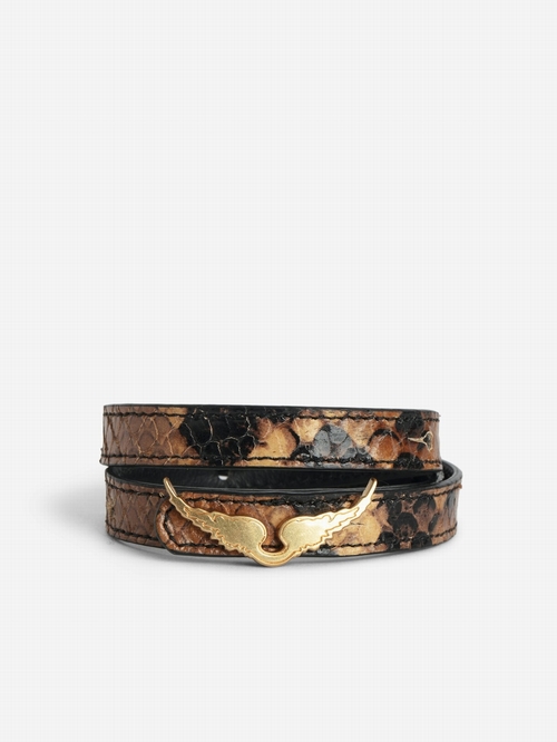 Embossed snake-effect leather bracelet with a wing.  -