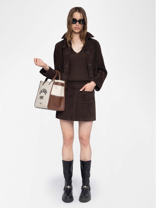 Short suede leather skirt with applied pockets and back zip