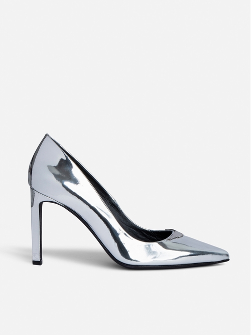 Silver patent leather court shoes with mirror wings charm. -