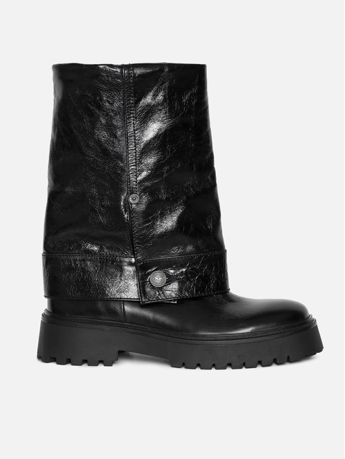 Trouser effect leather boots with vintage-inspired finish. -