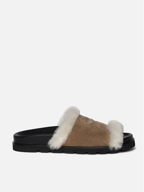 Open mules in suede and shearling adorned with signature