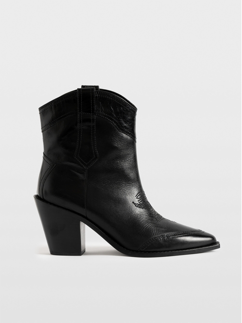 Smooth semi-glossy black leather tube boots adorned with a