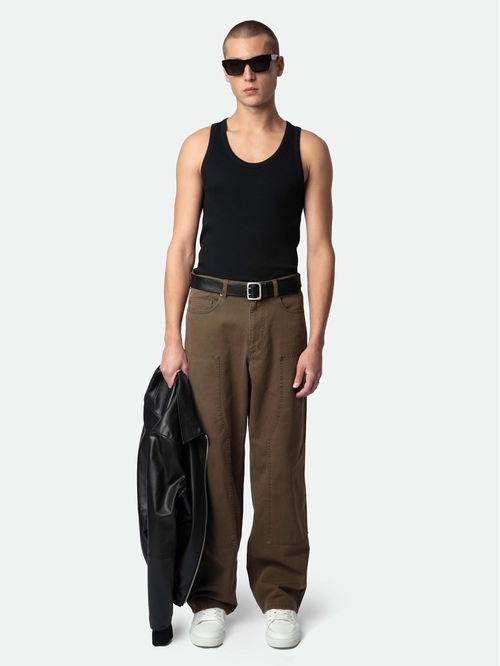 Worker-style trousers with front patch and rivet details.  -