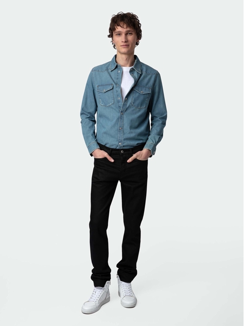 Distressed-effect blue denim shirt with long sleeves. -