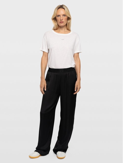 Pajama-style satin pants with pockets and elasticated