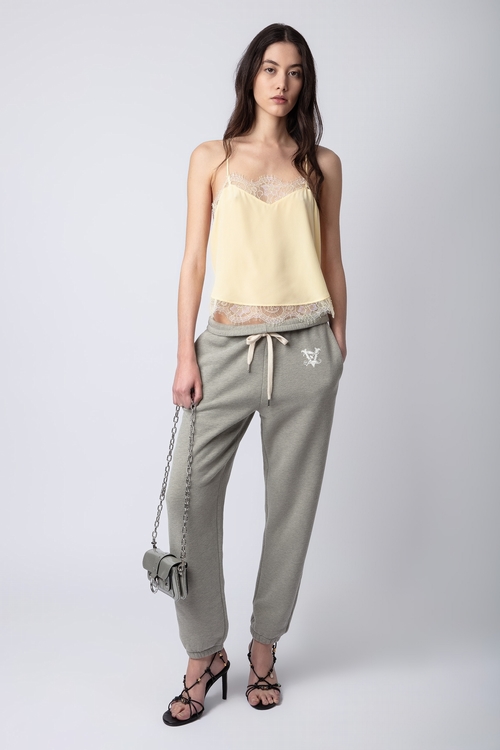 Grey jogging bottoms with drawstring ties and ZV print. -