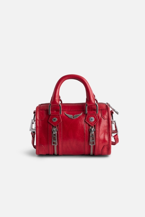 Small red vintage-effect patent leather bag with short