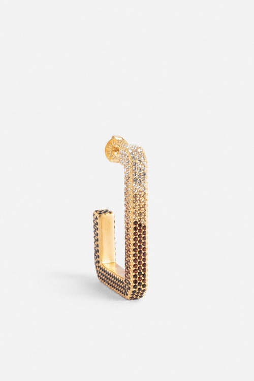C-shaped gold-tone brass earrings with gradated diamanté. -