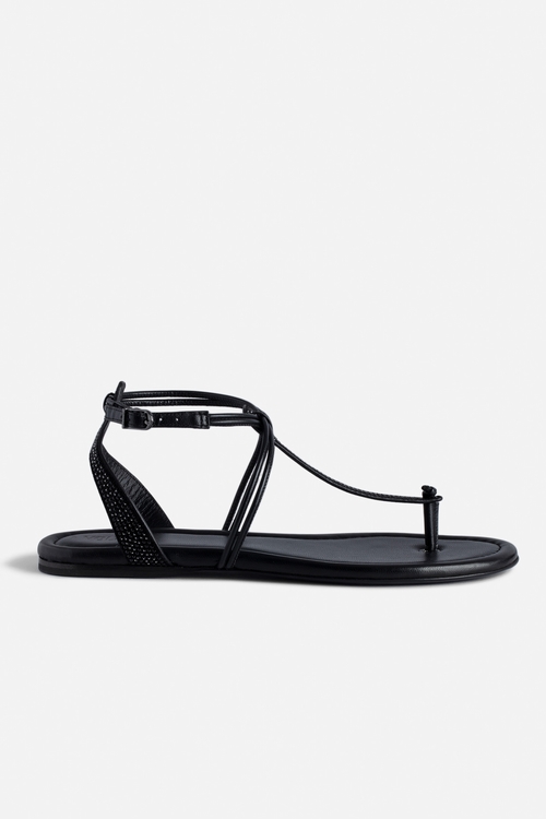 Black suede sandals with adjustable buckle and straps with