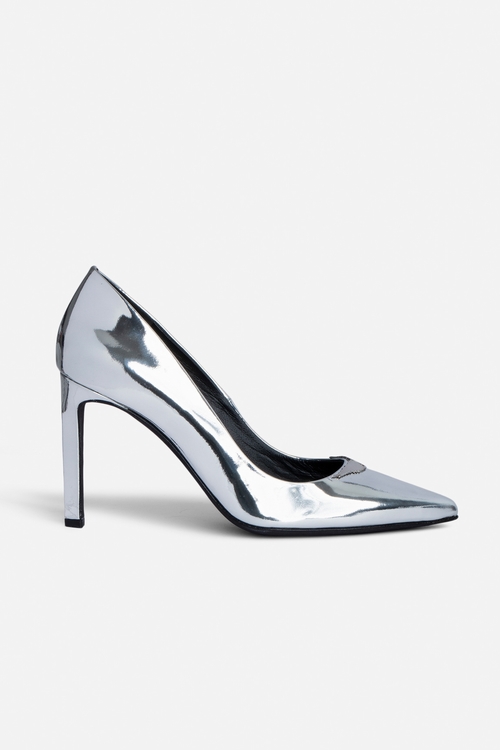 Silver patent leather court shoes with mirror wings charm. -