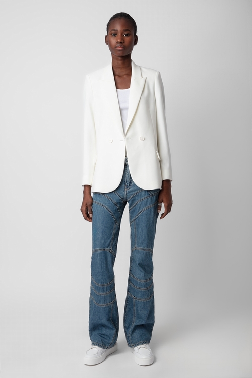 White blazer with pointed collar, button closure and
