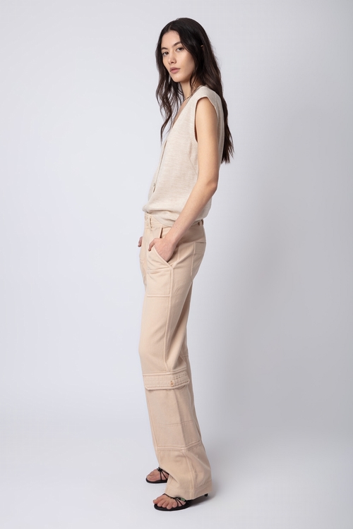 Beige cotton twill trousers with contrasting details. -