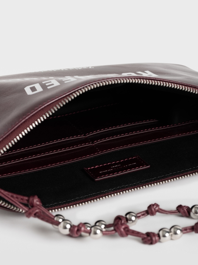 ANGEL POUCH MUSIC TAG CLUTCH