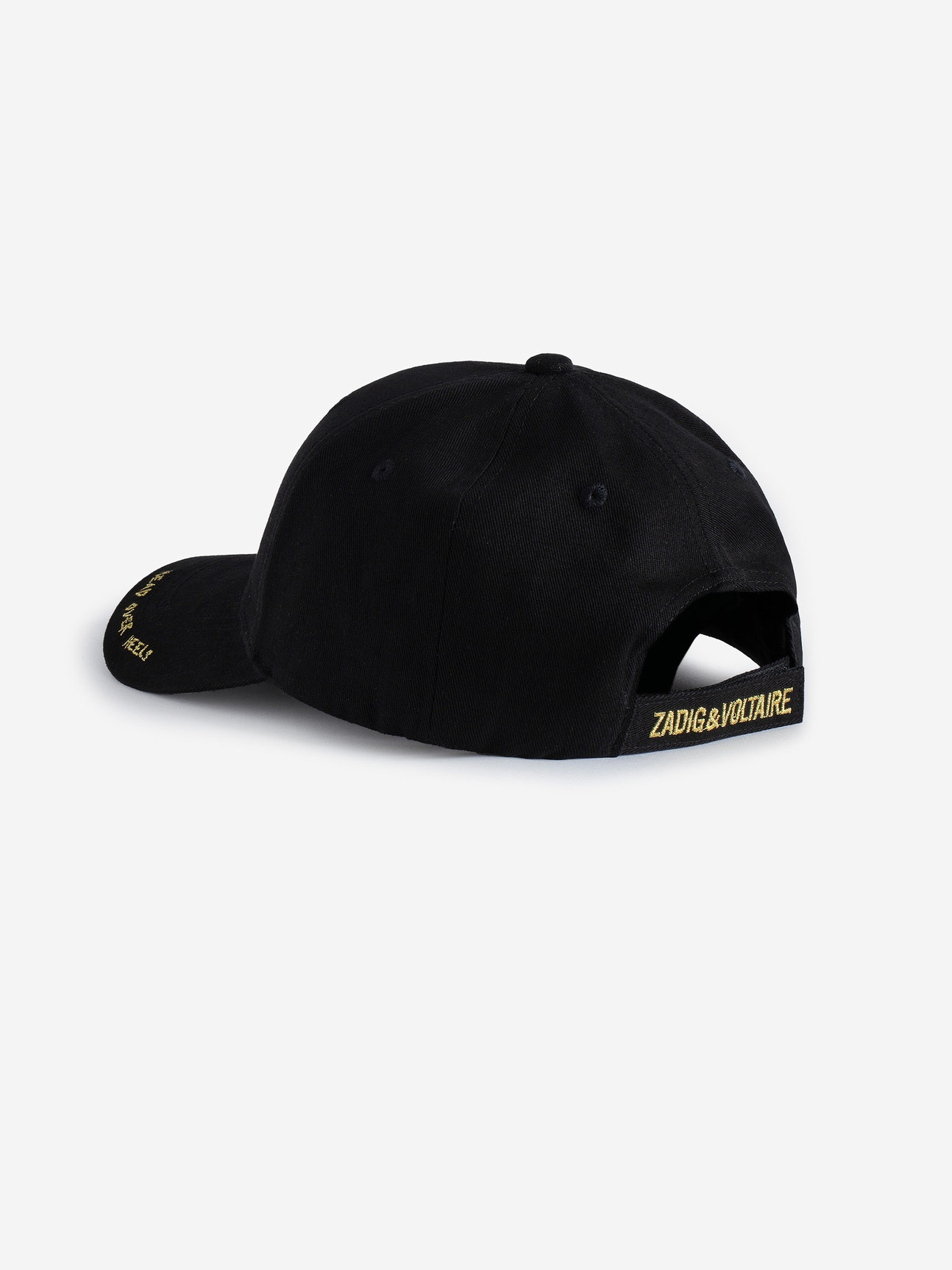 Voltaire Vice black cotton baseball cap.
The Head Over Heels Baseball Cap is part of the VOLTAIRE VICE capsule. Zadig&Voltaire is experimenting with a new creative space, where freedom is the watchword. The brand is adding its signature to everyday objects that are both practical and decorative, where design is as important as purpose.

- Black cotton baseball cap
- Gold contrasting wings embroidery on the front
- Adjustable strap
Diameter: 19 cm

Composition

100% COTTON